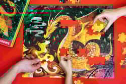 Galeria - zdjęcie nr. 2 - Książka i puzzle Smoki 100 elementów