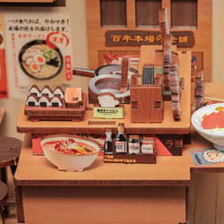 Galeria - zdjęcie nr. 3 - Miniaturowy domek Book Nook Bar w Tokio